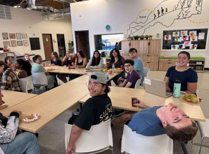 smiling students at the TLC meeting